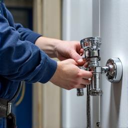 Skilled tradesperson installing bathroom fixtures with precision